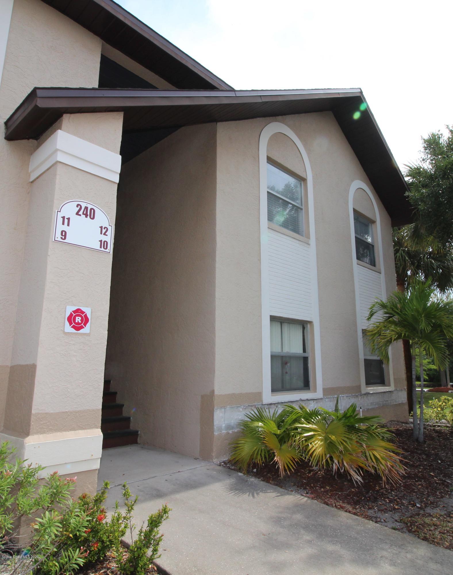 240 Spring Drive, Unit 12 Merritt Island, FL 32953 - Photo 1 of 14 Front - IMG_6530
