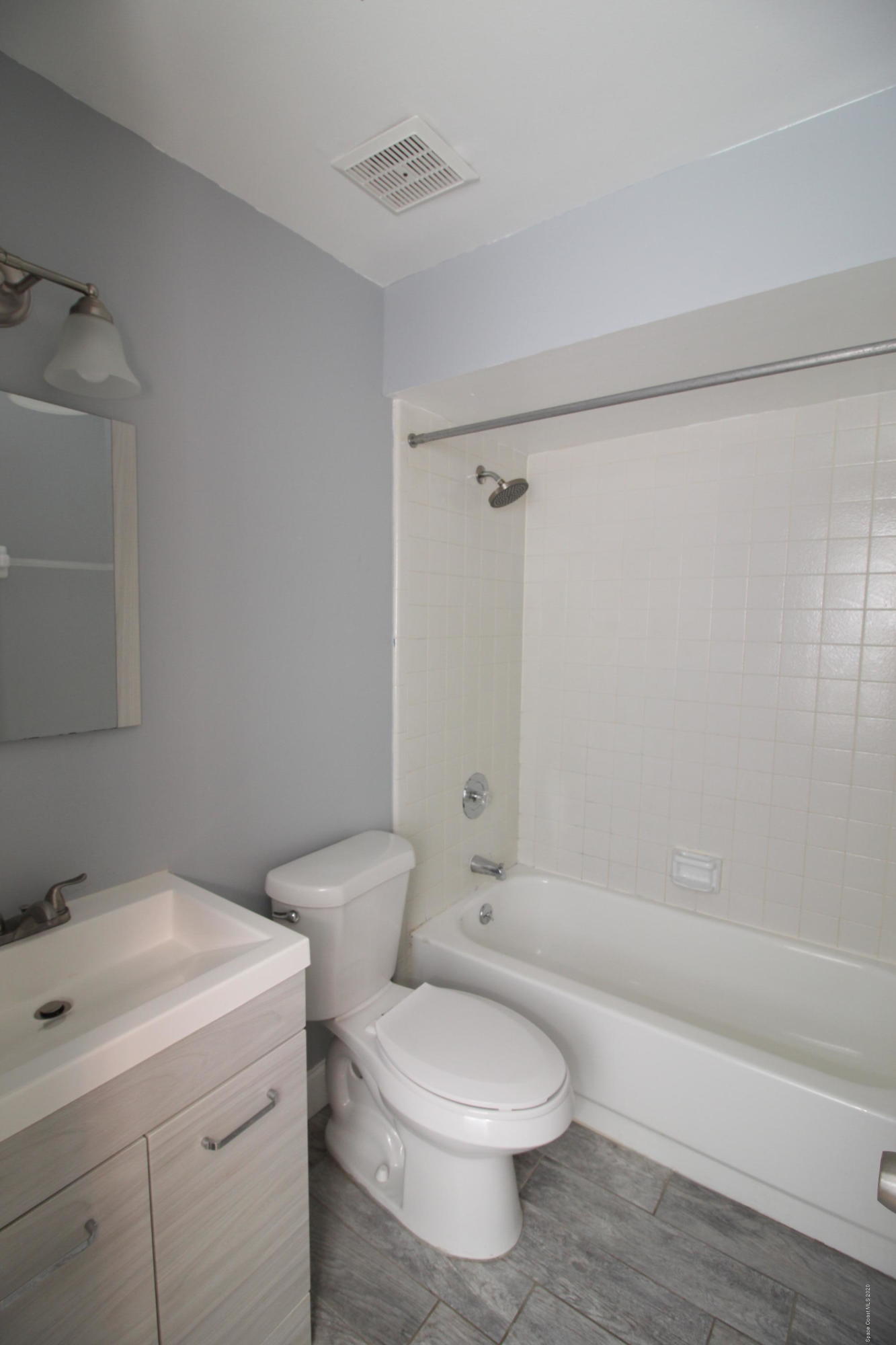 240 Spring Drive, Unit 12 Merritt Island, FL 32953 - Photo 10 of 14 Guest Bath - IMG_6503