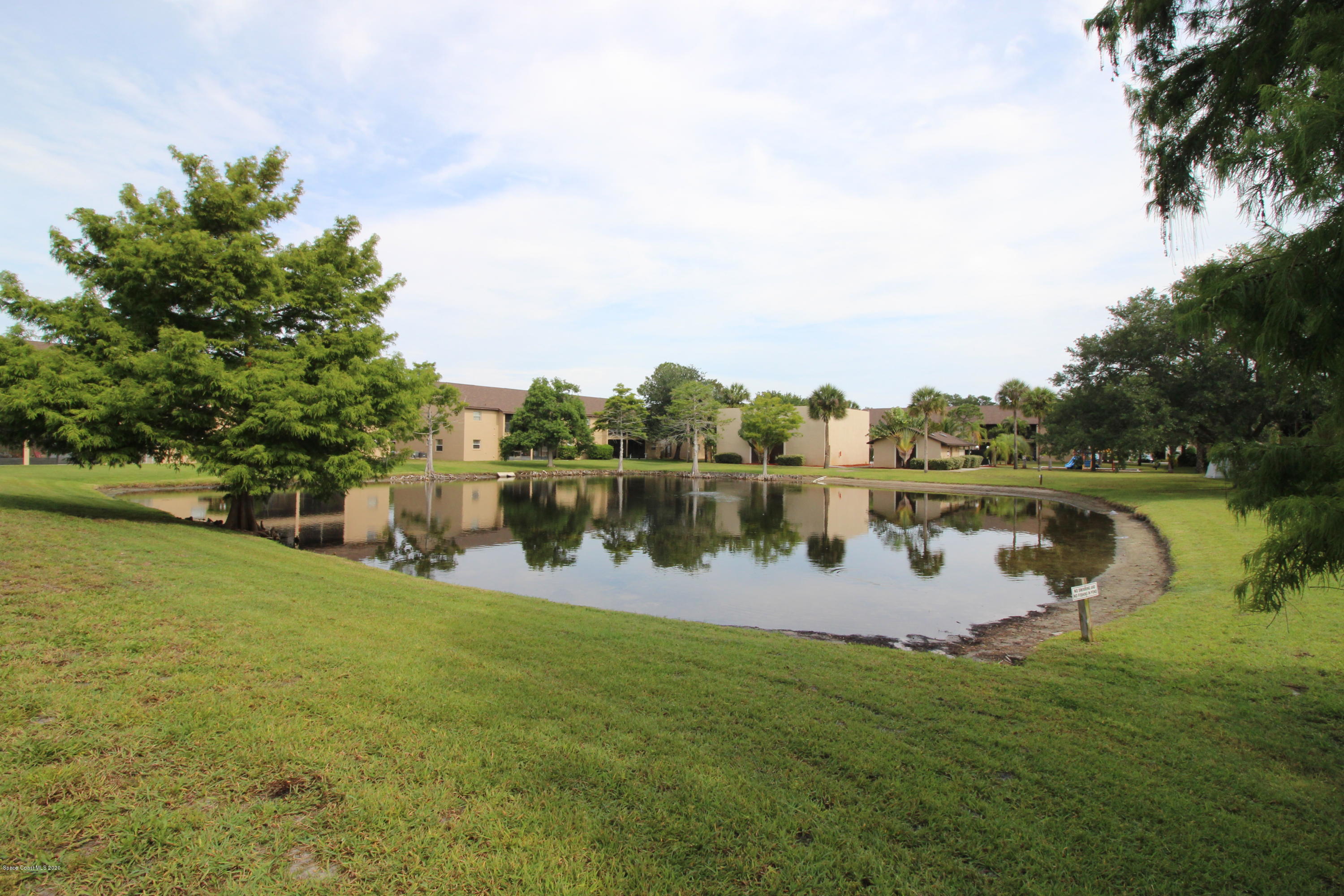 240 Spring Drive, Unit 12 Merritt Island, FL 32953 - Photo 12 of 14 Pond - IMG_6533