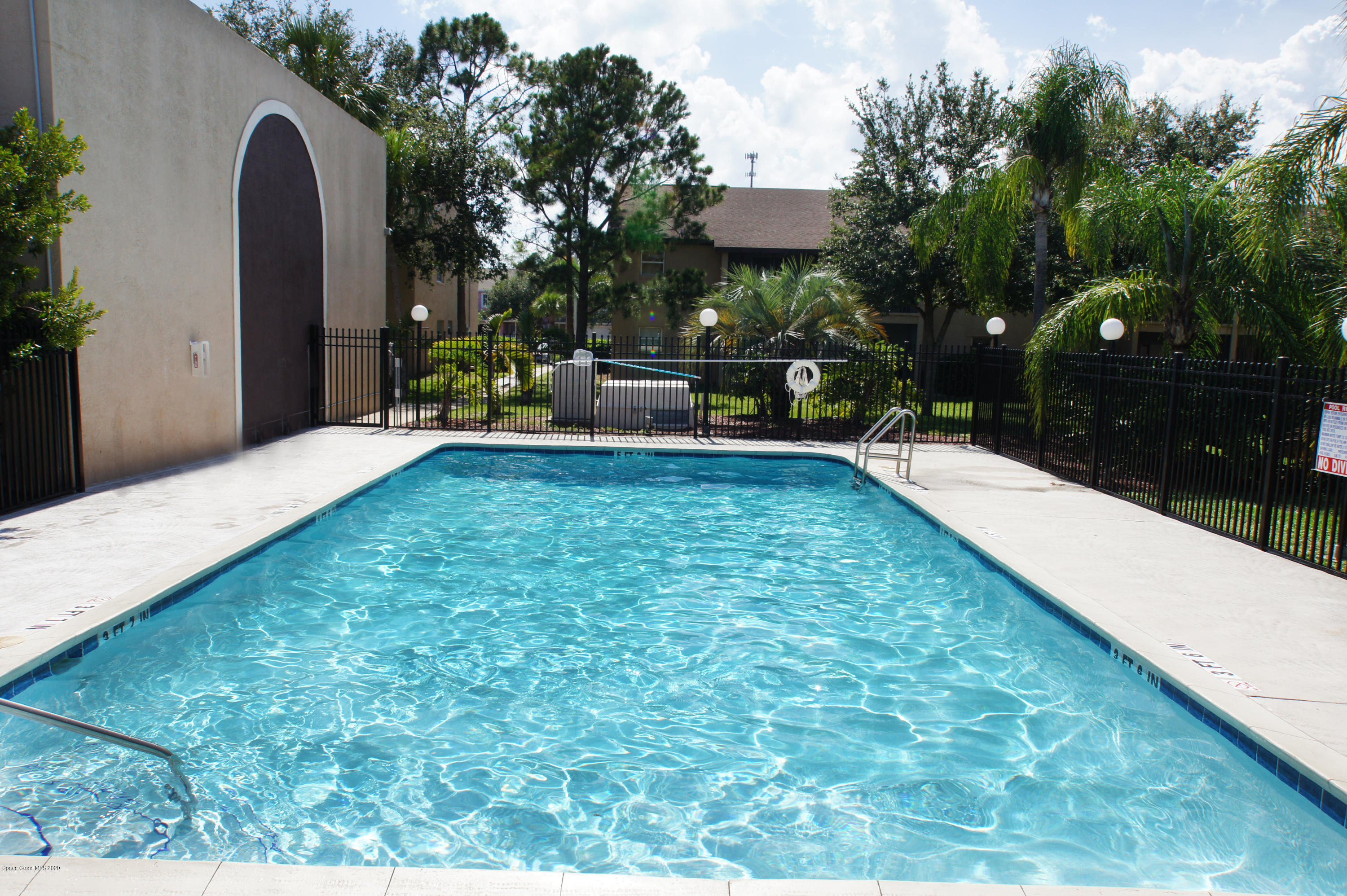 240 Spring Drive, Unit 12 Merritt Island, FL 32953 - Photo 13 of 14 A- Pool