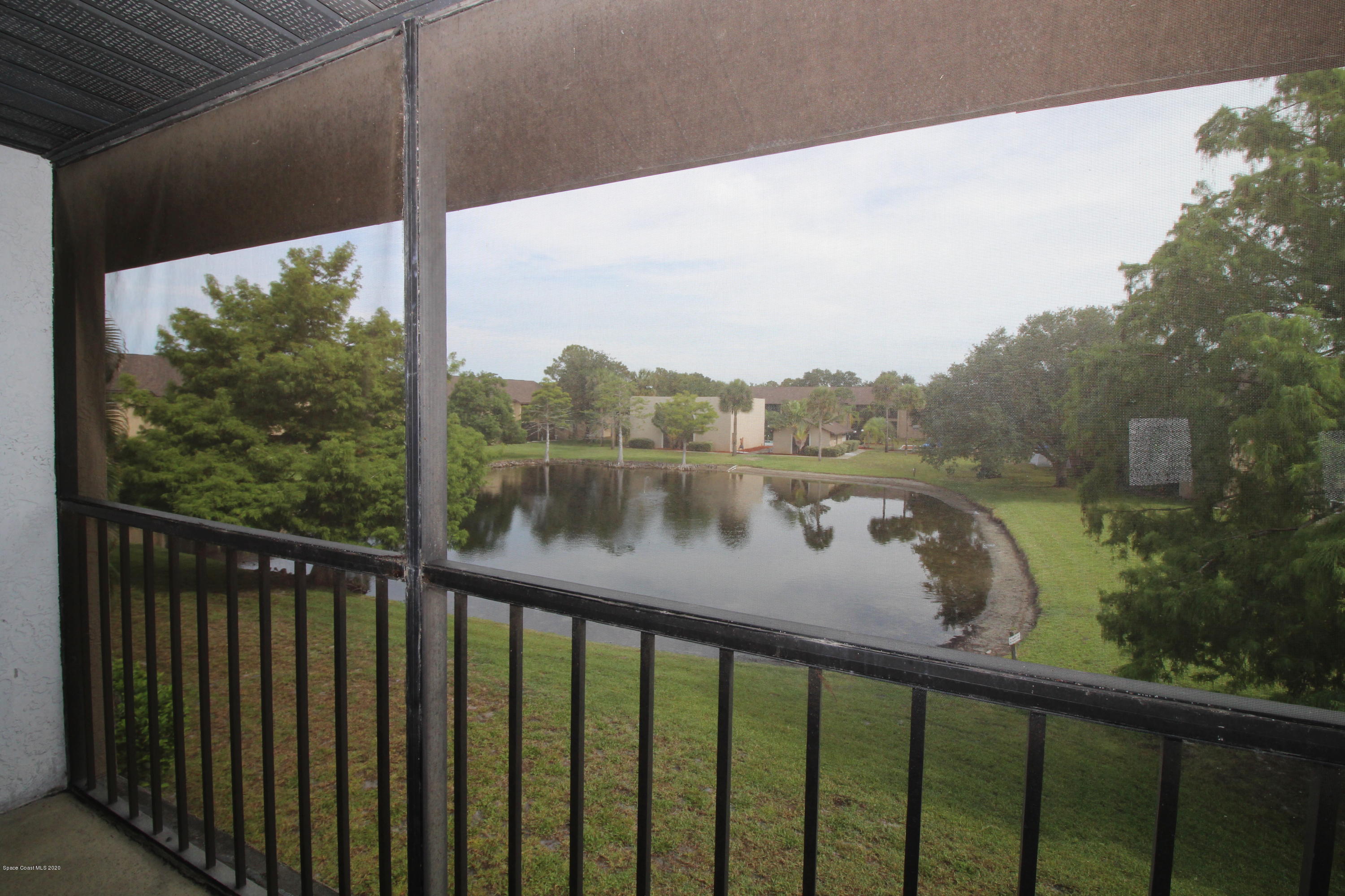 240 Spring Drive, Unit 12 Merritt Island, FL 32953 - Photo 3 of 14 Balcony View - IMG_6525