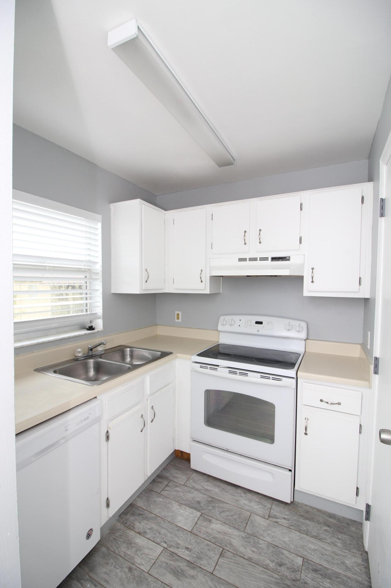 240 Spring Drive, Unit 12 Merritt Island, FL 32953 - Photo 5 of 14 Kitchen - IMG_6491