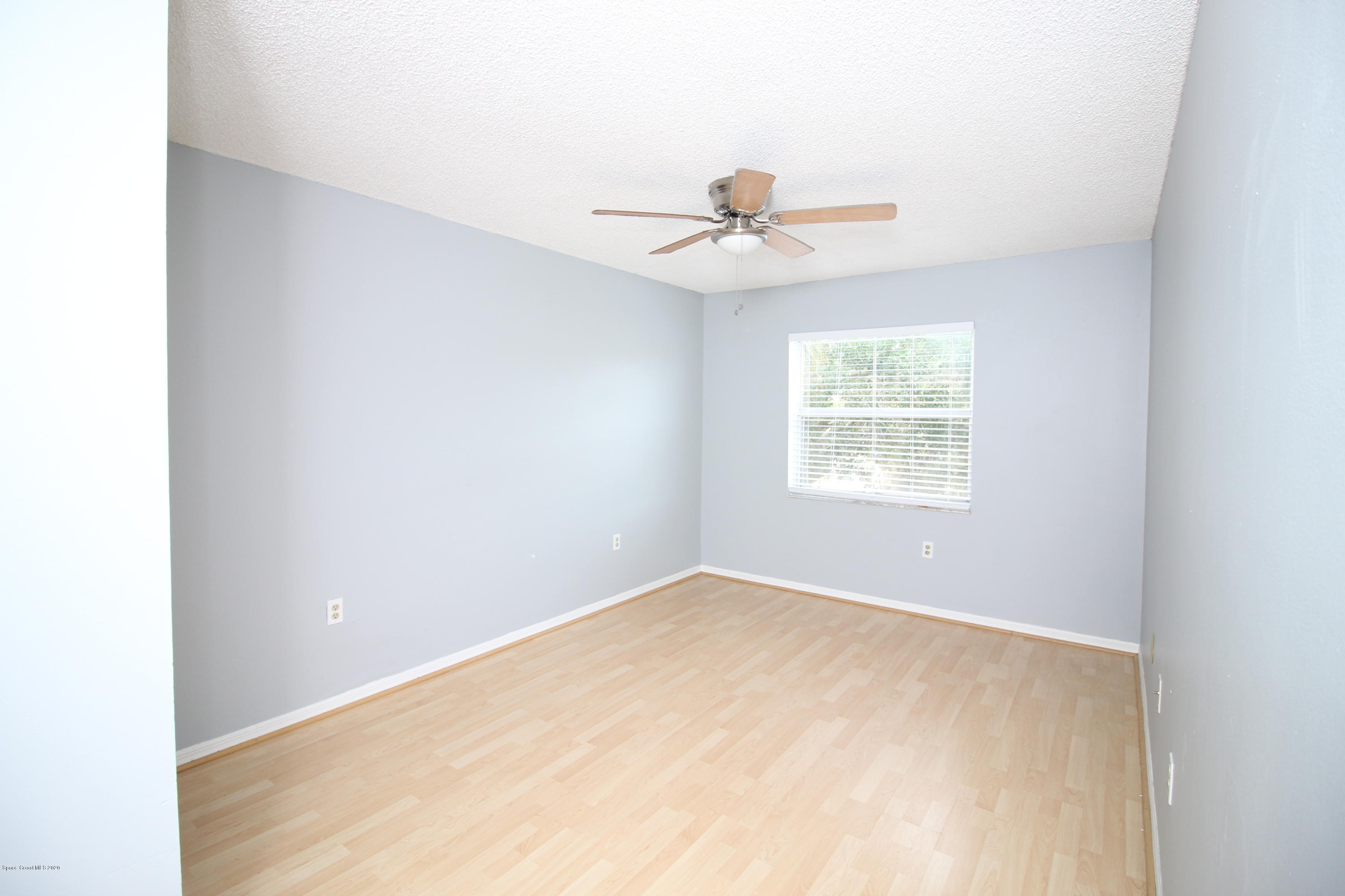 240 Spring Drive, Unit 12 Merritt Island, FL 32953 - Photo 6 of 14 Master BR - IMG_6512