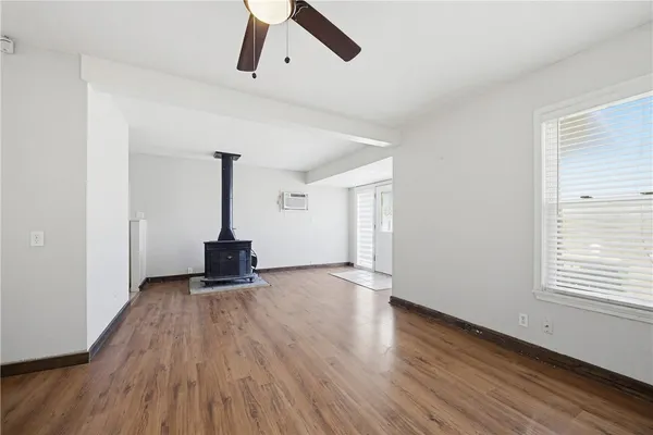 a view of entryway with wooden floor
