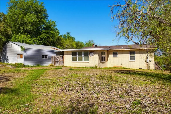 a view of a yard with an trees