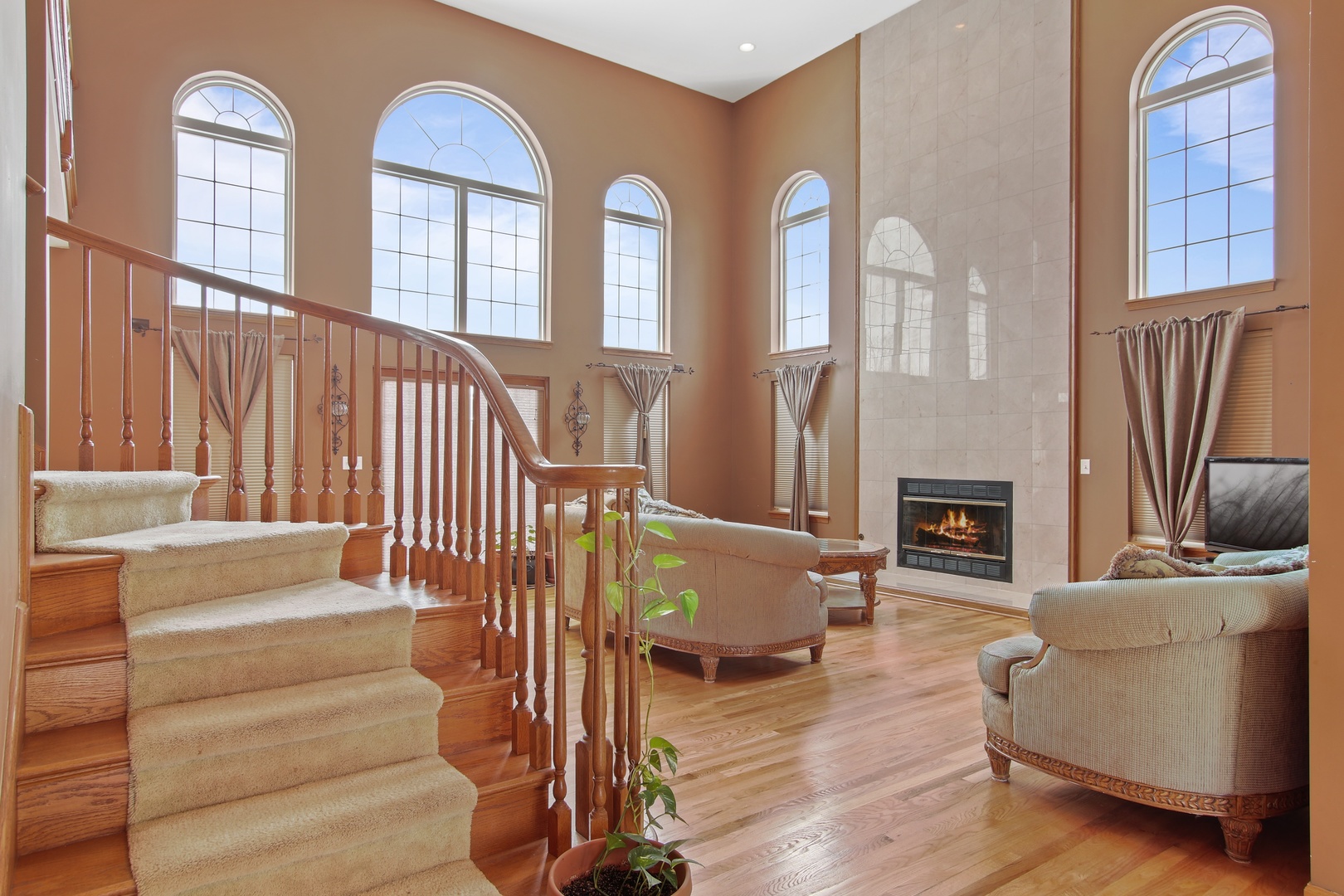 3111 Mini Drive Wadsworth, IL 60083 - Photo 2 of 17 a living room with furniture fireplace and flat screen tv
