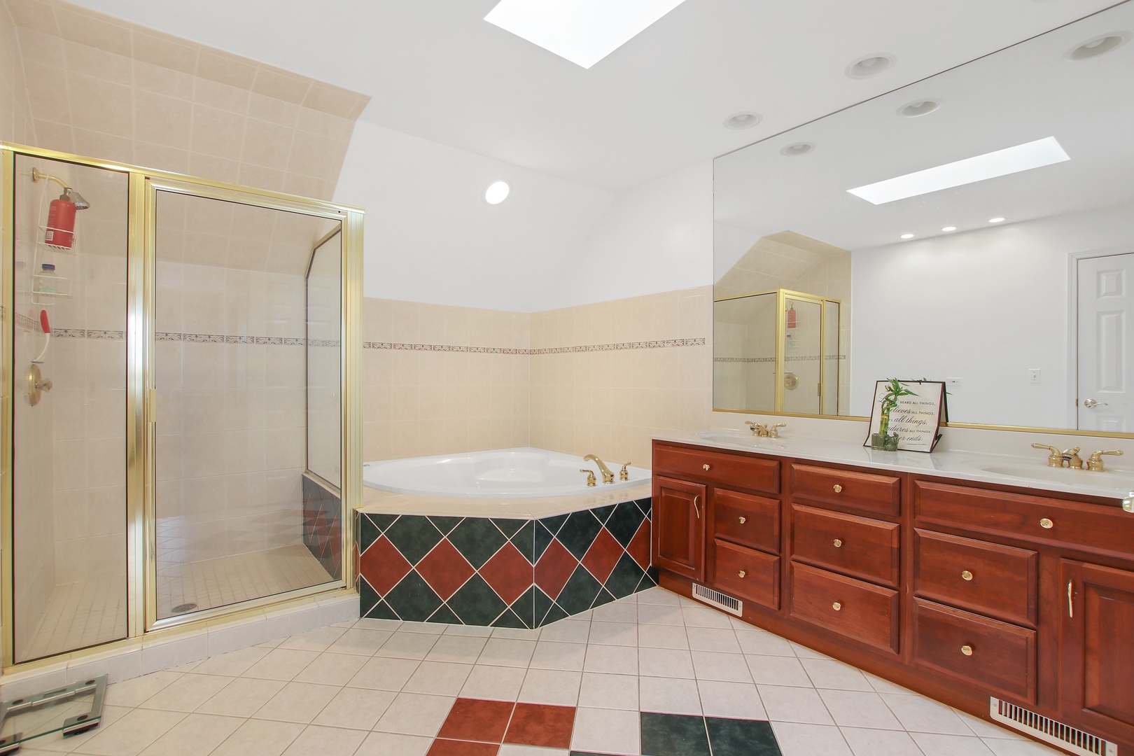3111 Mini Drive Wadsworth, IL 60083 - Photo 9 of 17 a bathroom with a double vanity sink mirror and shower