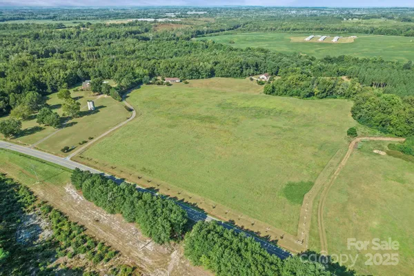 a view of a yard with an outdoor space