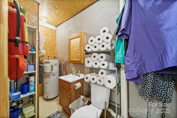 a utility room with multiple dryer and washer