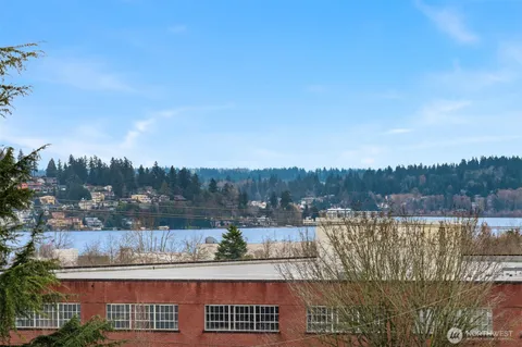 a view of a lake with a big yard
