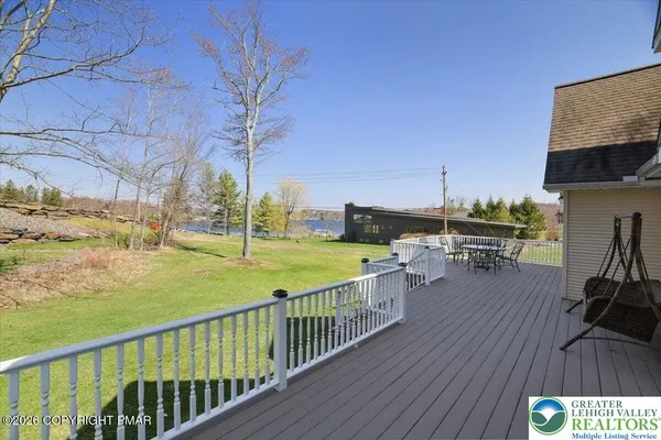 a view of a patio with wooden floor