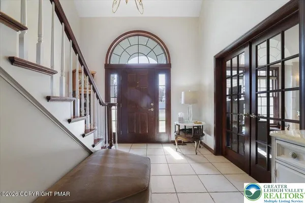a view of hall way with staircase