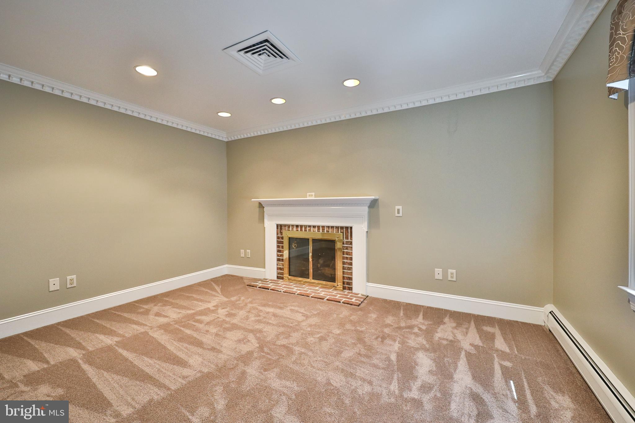 1345 Fording Brook Road Ambler, PA 19002 - Photo 31 of 60 Sitting Room w/ Gas Fireplace