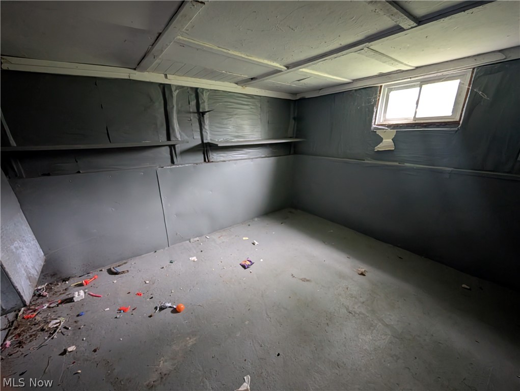 475 East 146th Street Cleveland, OH 44110 - Photo 25 of 28 Enclosed interior space featuring a single window, a flat ceiling, painted walls, and a concrete floor