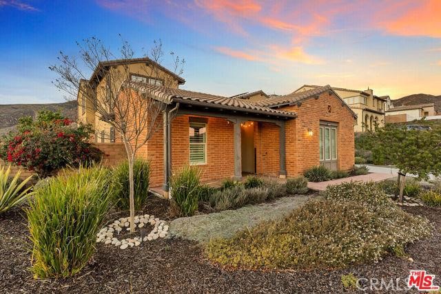 446 Via Maggiore Chula Vista, CA 91914 - Photo 1 of 30 a front view of a house with a yard