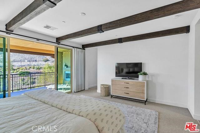 446 Via Maggiore Chula Vista, CA 91914 - Photo 11 of 30 a bedroom with a bed and a television