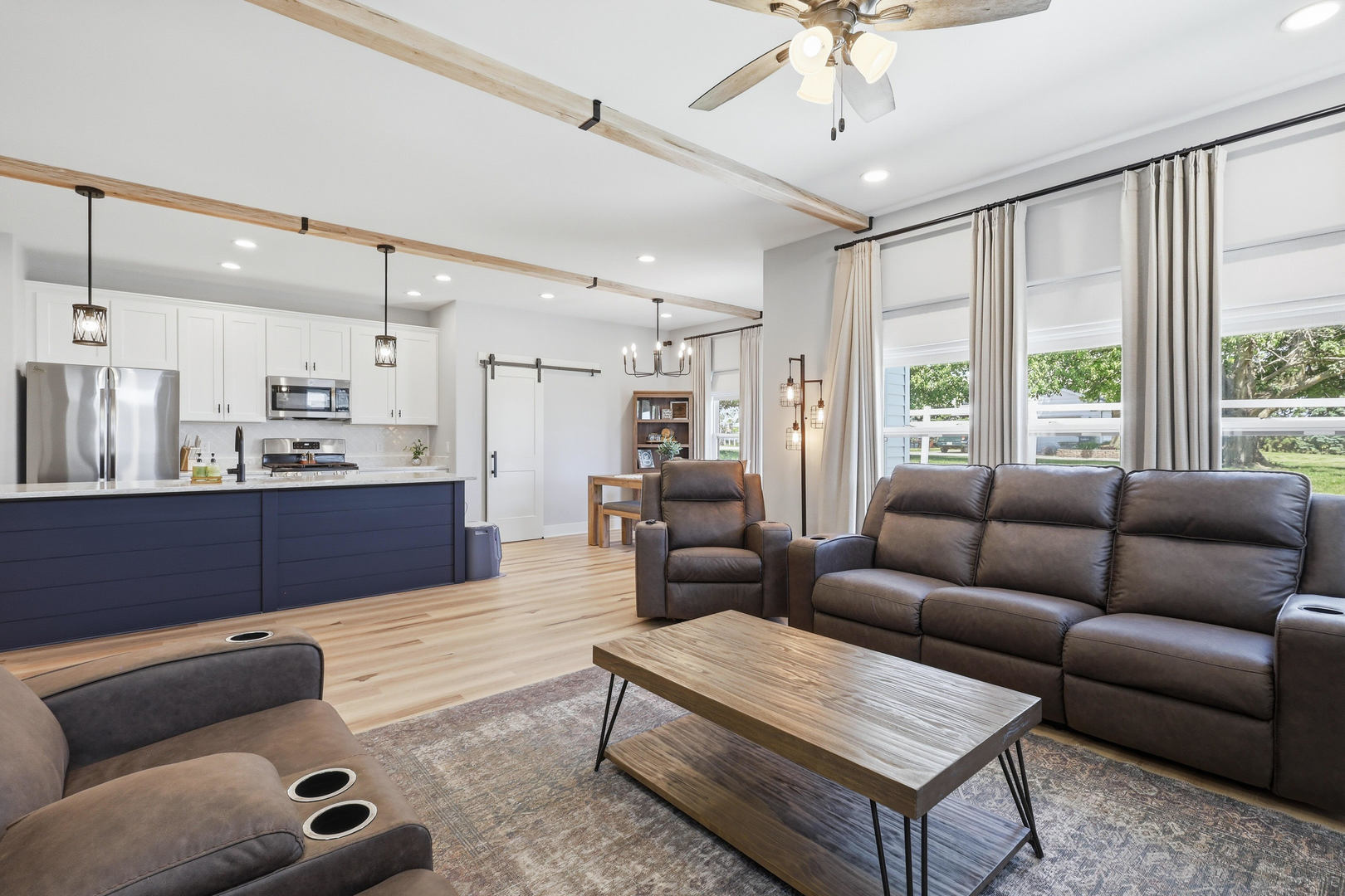 6779 Genesis Way Bettendorf, IA 52722 - Photo 12 of 36 a living room with furniture and a large window