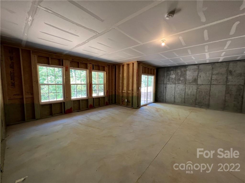 3155 Windhaven Lane, Unit 80 Tega Cay, SC 29708 - Photo 19 of 28 an empty room with windows
