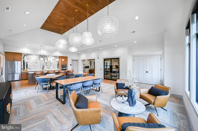 a large kitchen with a stove top oven