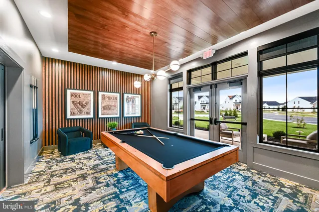 a outdoor living space with furniture and book shelf