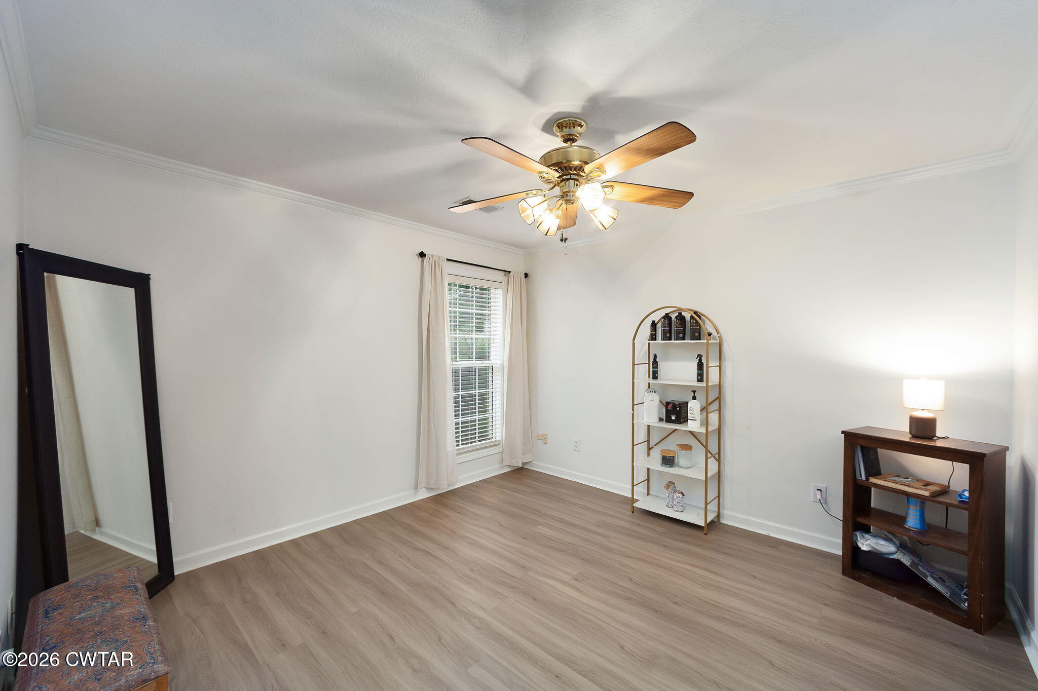 80 Rooker Drive Jackson, TN 38305 - Photo 18 of 30 wooden floor in an empty room with a window