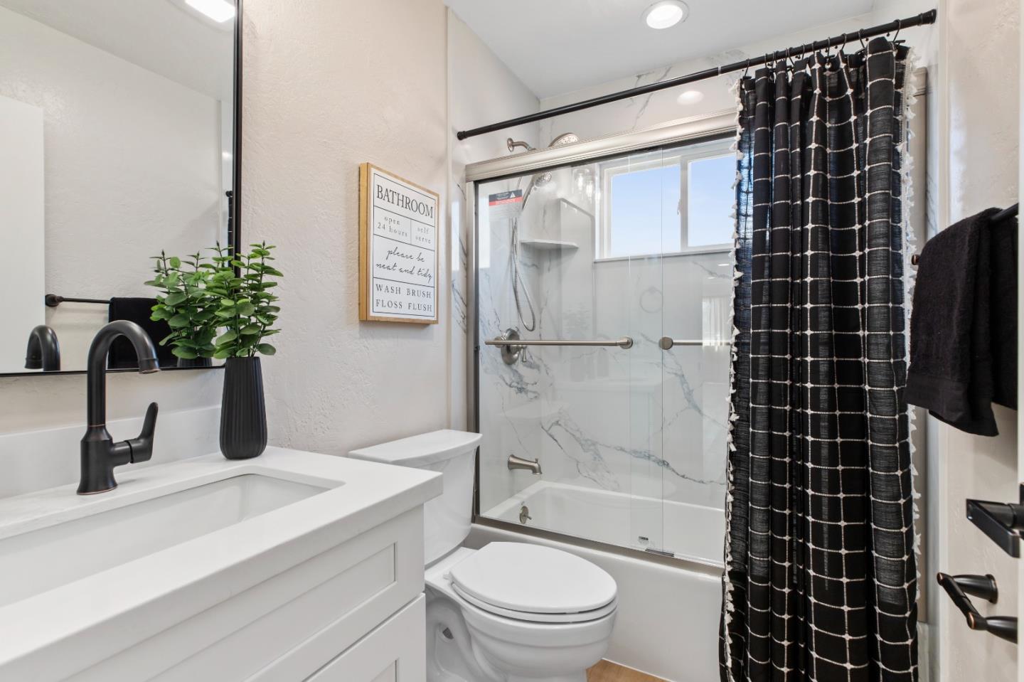 2425 Kildare Lane Modesto, CA 95354 - Photo 14 of 21 a bathroom with a toilet a sink and a shower