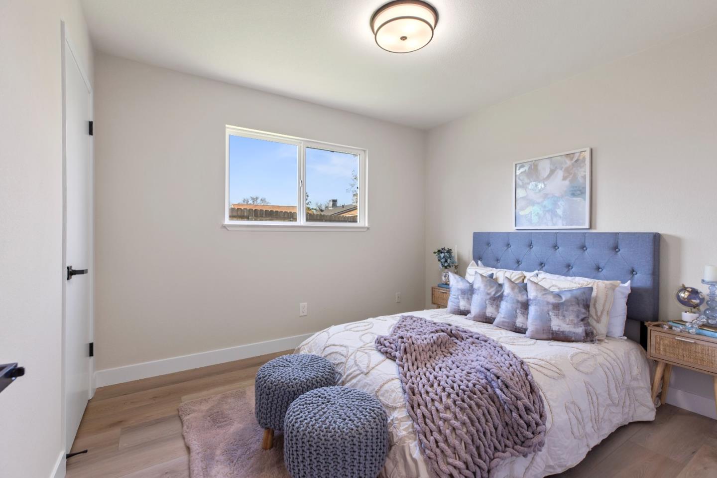 2425 Kildare Lane Modesto, CA 95354 - Photo 16 of 21 a bedroom with a bed and a window