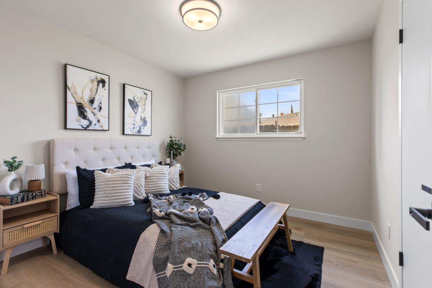 2425 Kildare Lane Modesto, CA 95354 - Photo 17 of 21 a bedroom with a bed and a table