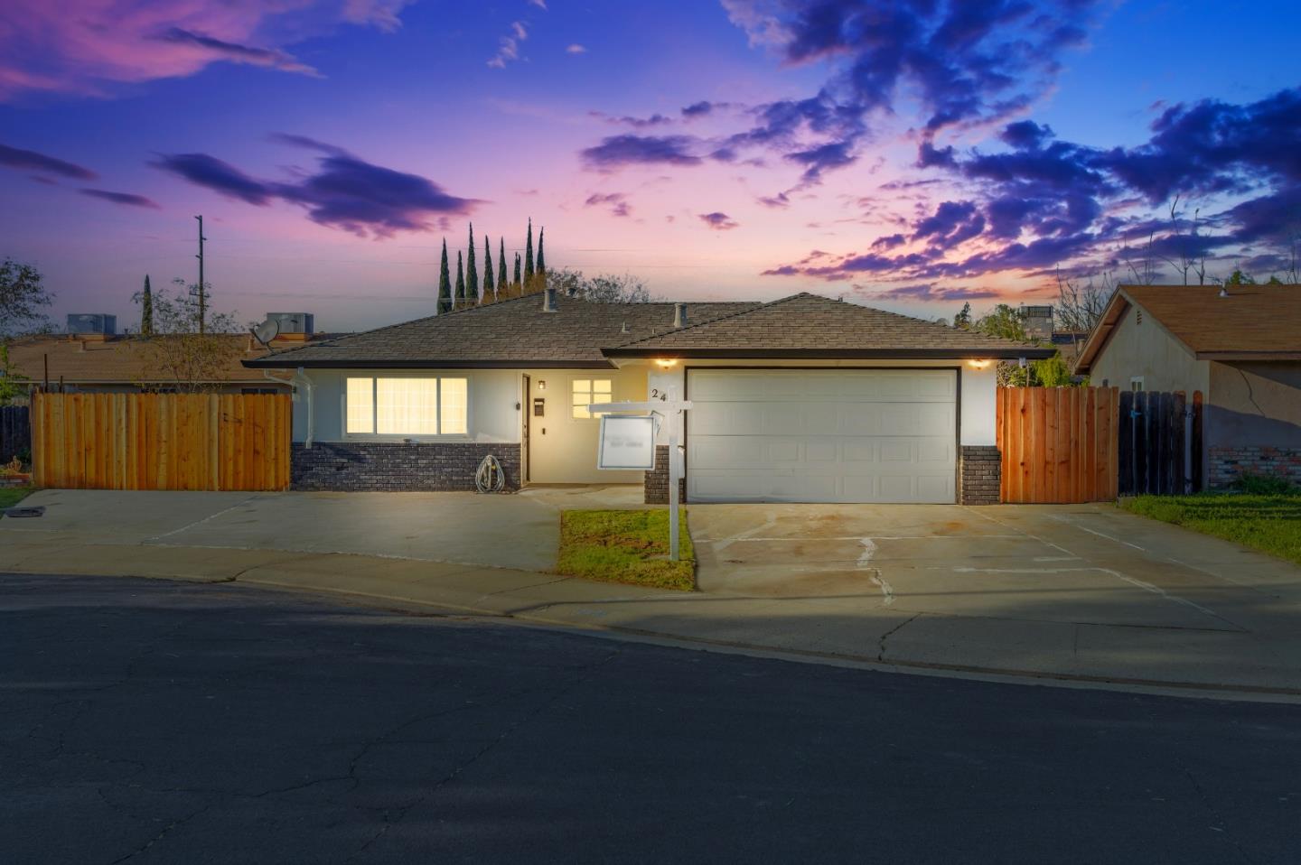 2425 Kildare Lane Modesto, CA 95354 - Photo 2 of 21 a front view of a house with a yard