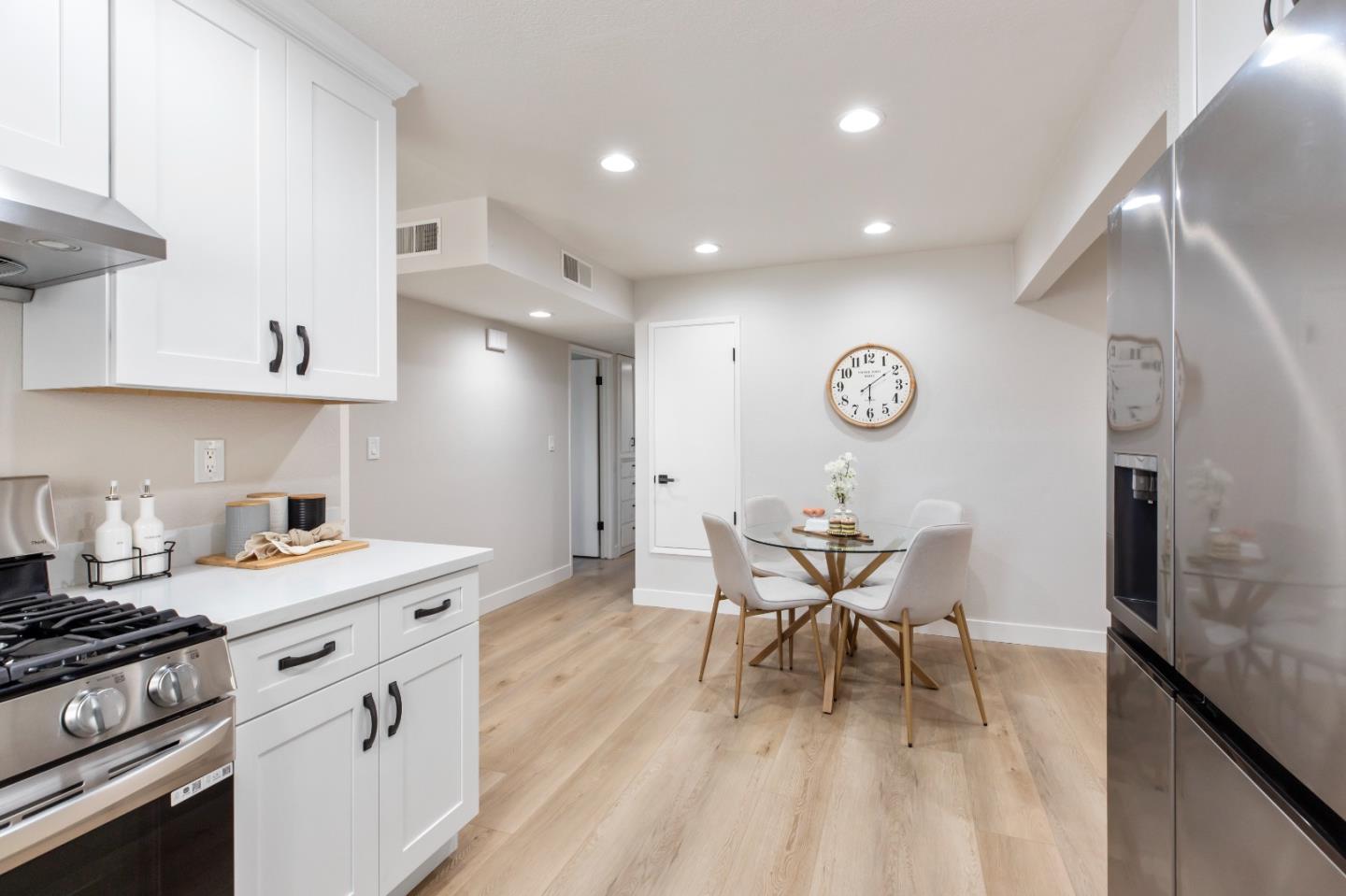 2425 Kildare Lane Modesto, CA 95354 - Photo 10 of 21 a kitchen with a table and chairs in it