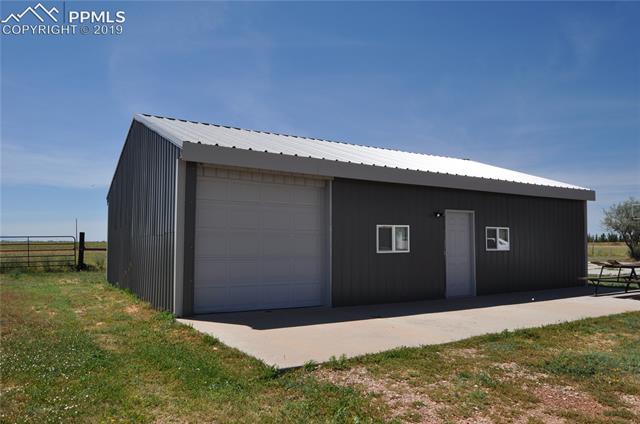 36825 East Jones Road Yoder, CO 80864 - Photo 28 of 35 Detached workshop includes an add'l single-car garage space.