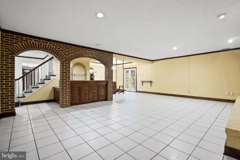 a kitchen with a stove and a refrigerator