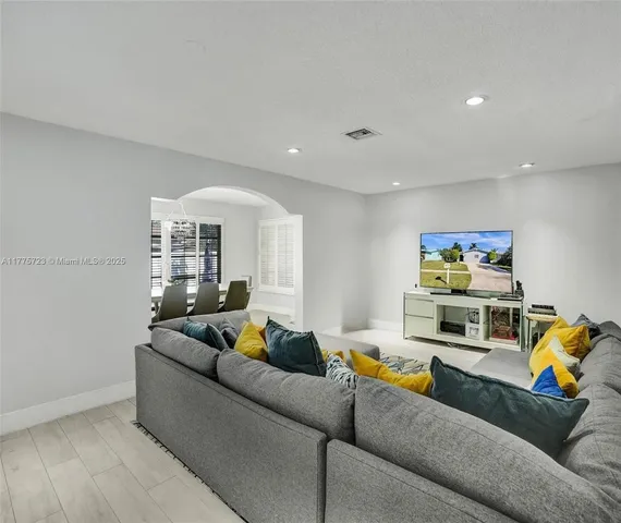 a living room with furniture and a couch
