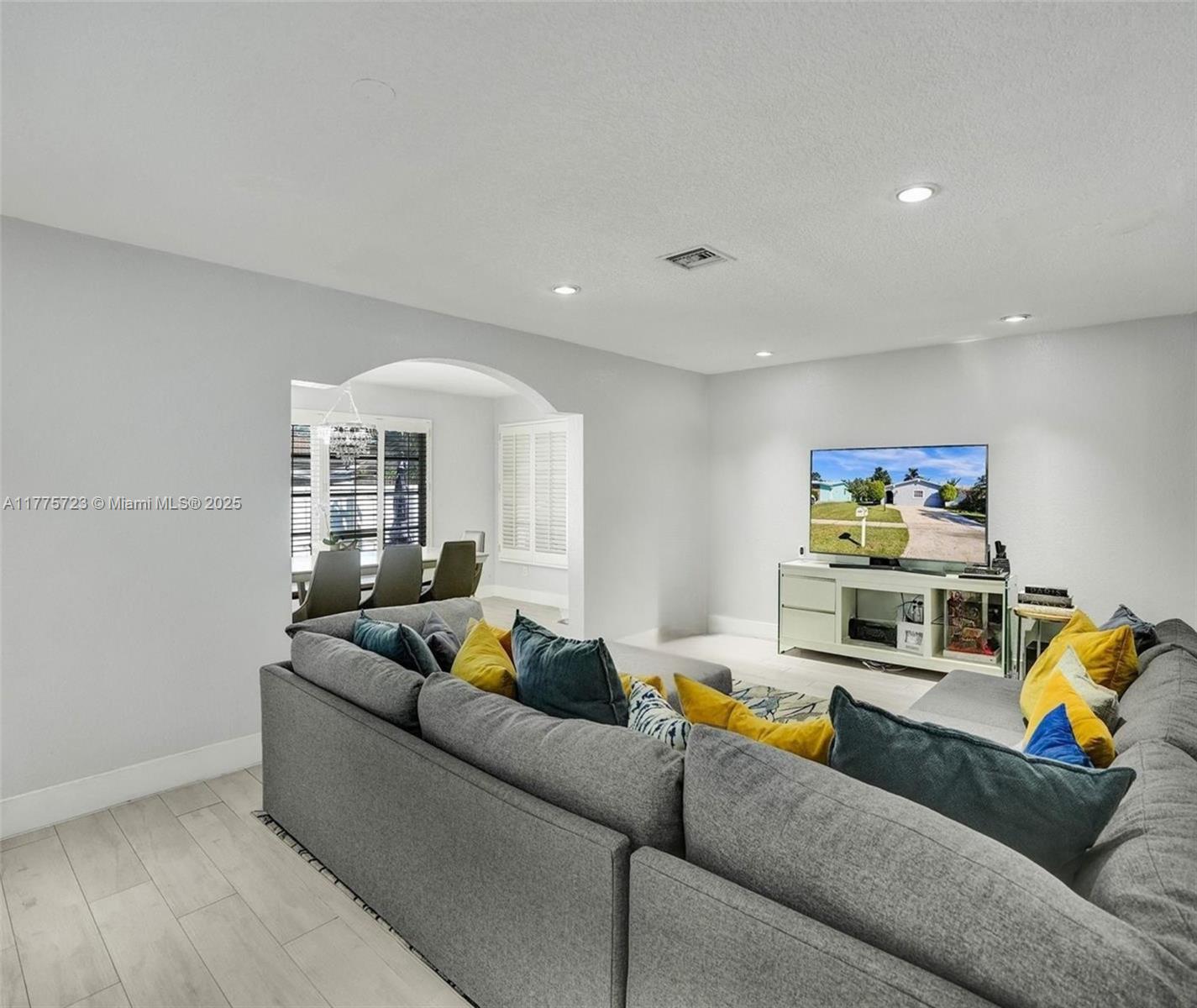 217 Southeast 5th Street Dania Beach, FL 33004 - Photo 11 of 26 a living room with furniture and a couch