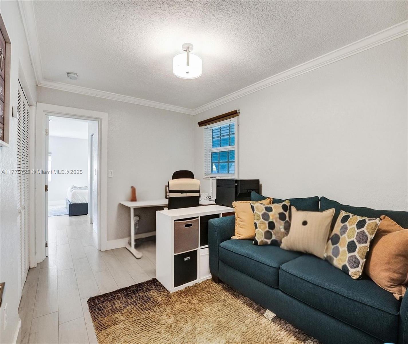 217 Southeast 5th Street Dania Beach, FL 33004 - Photo 19 of 26 a view of a livingroom with furniture and wooden floor