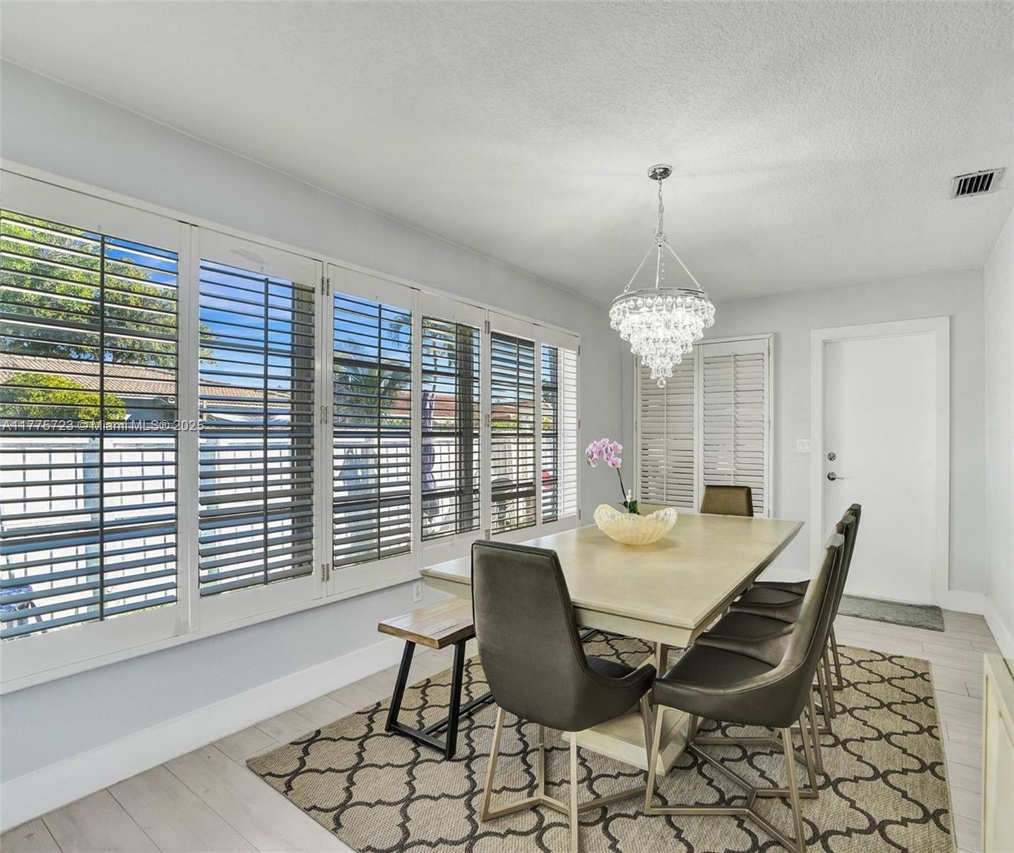 217 Southeast 5th Street Dania Beach, FL 33004 - Photo 9 of 26 a view of a dining room with furniture window and outside view