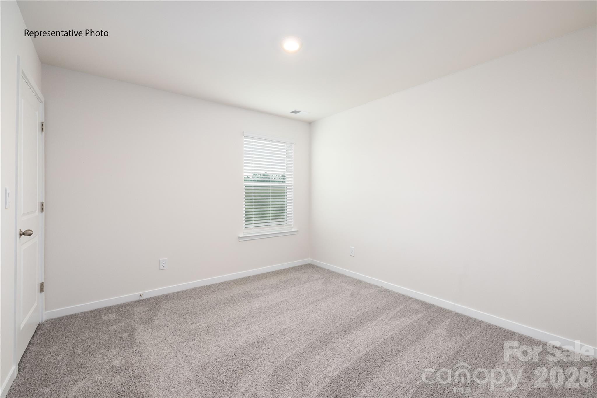 1406 Mammoth Road Hickory, NC 28602 - Photo 22 of 24 an empty room with a window