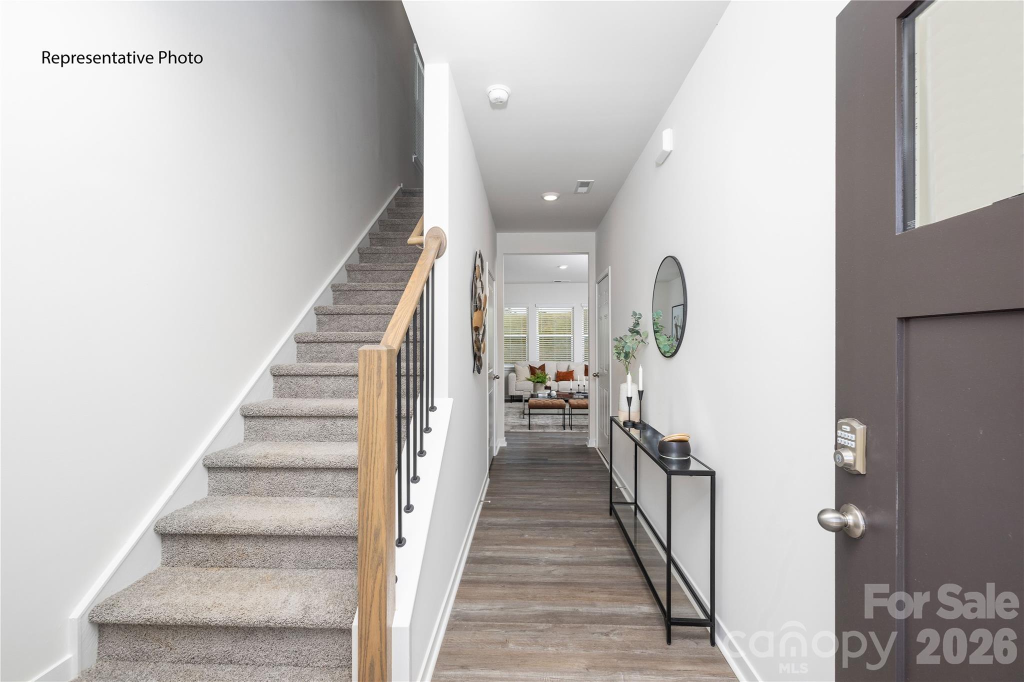 1406 Mammoth Road Hickory, NC 28602 - Photo 3 of 24 a view of entryway and hall with wooden floor