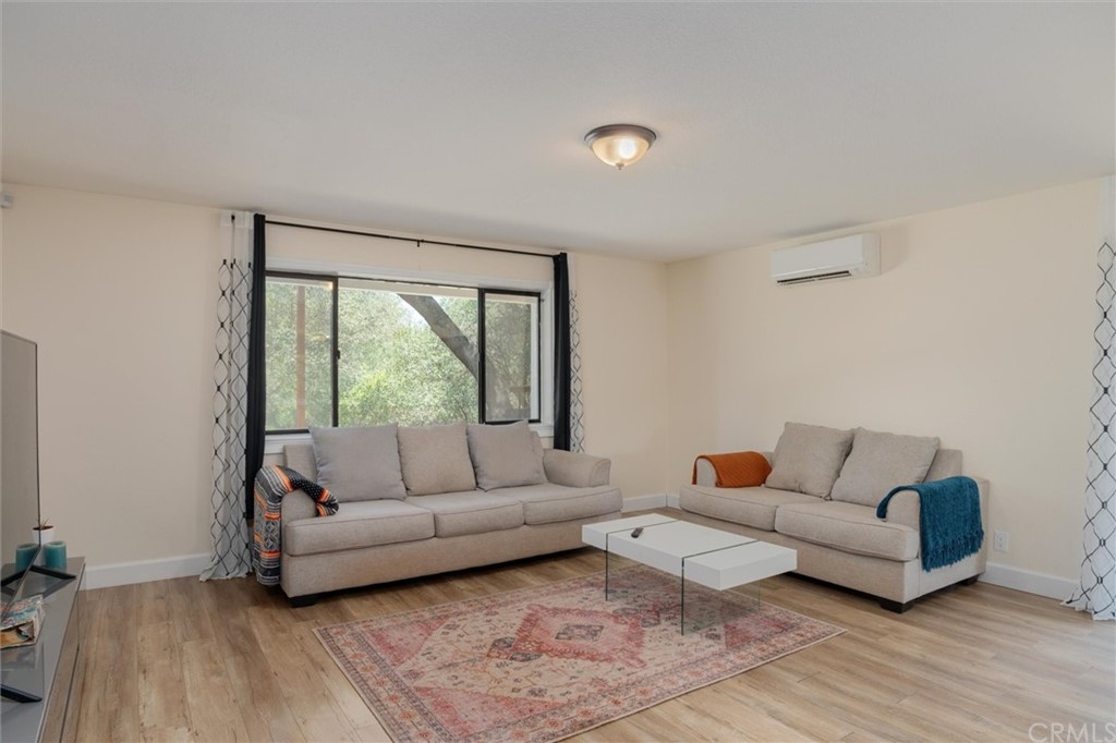 89 Glen Cir Drive Oroville, CA 95966 - Photo 13 of 32 a living room with furniture and a large window