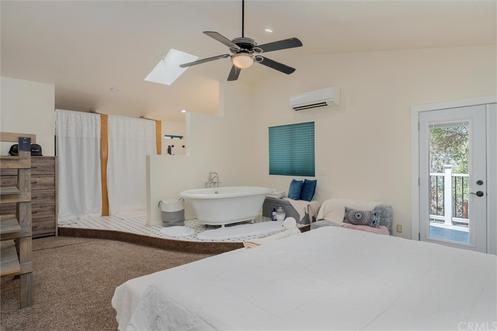 89 Glen Cir Drive Oroville, CA 95966 - Photo 17 of 32 a bedroom with a bed and ceiling fan
