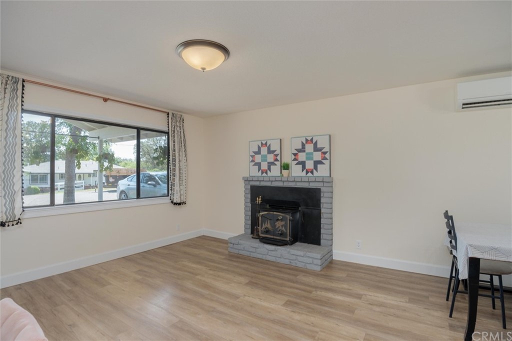 89 Glen Cir Drive Oroville, CA 95966 - Photo 5 of 32 a view of empty room with wooden floor and fan