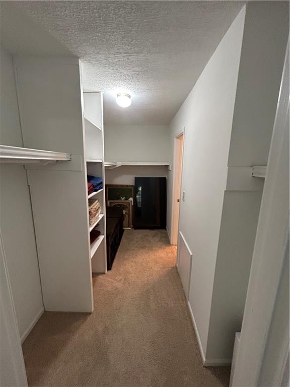 6851 Roswell Road, Unit O10 Atlanta, GA 30328 - Photo 10 of 20 a view of empty room with refrigerator