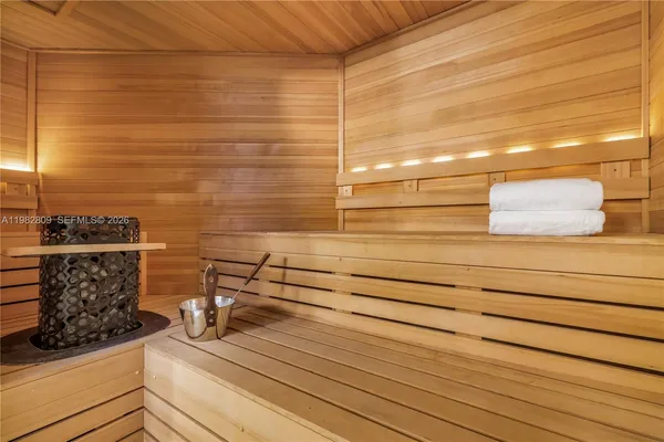 a view of kitchen and wooden floor