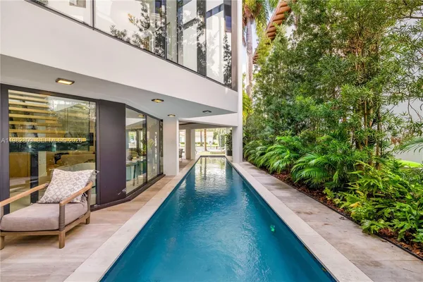 a view of a yard with a patio