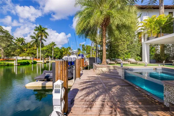 a view of a house with a swimming pool