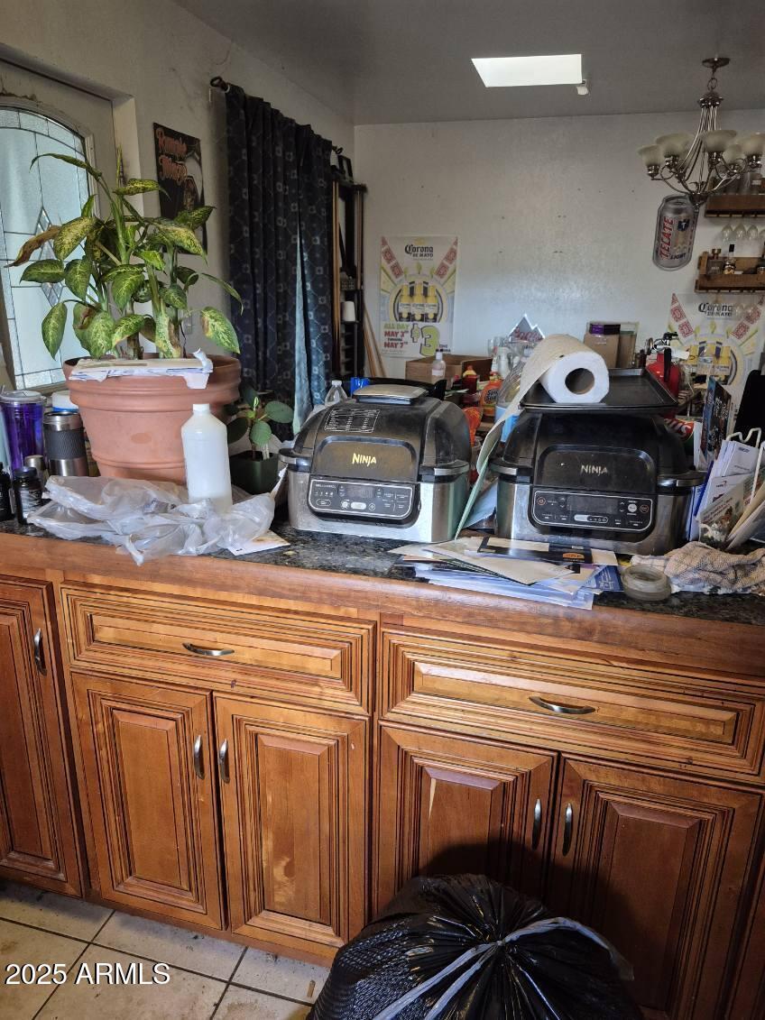 404 Calle Madrid Rio Rico, AZ 85648 - Photo 13 of 26 a close view of sink and plant