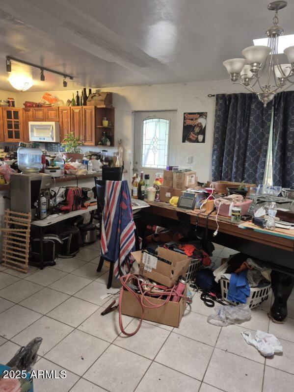 404 Calle Madrid Rio Rico, AZ 85648 - Photo 14 of 26 a living room with lots of furniture and kitchen view