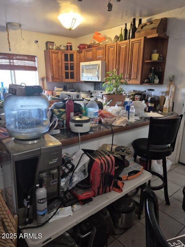 404 Calle Madrid Rio Rico, AZ 85648 - Photo 15 of 26 a room with musical instruments