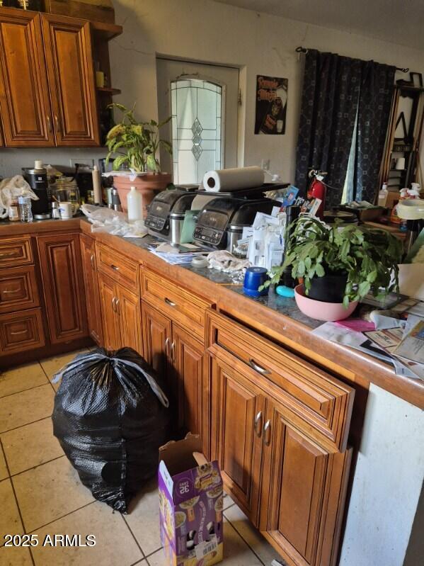 404 Calle Madrid Rio Rico, AZ 85648 - Photo 16 of 26 a kitchen with sink and refrigerator