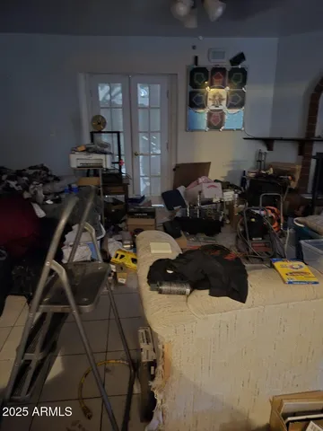 a room with storage and furniture